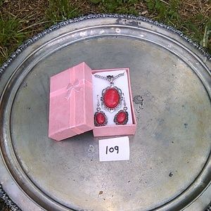 red and silver neaklace and earring set